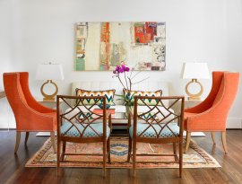 Transitional living room with pops of orange [Design: Leigh Olive Mowry-Olive Interiors]